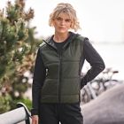 Model wearing Tee Jays Womens Hybrid-Stretch Hooded Jacket