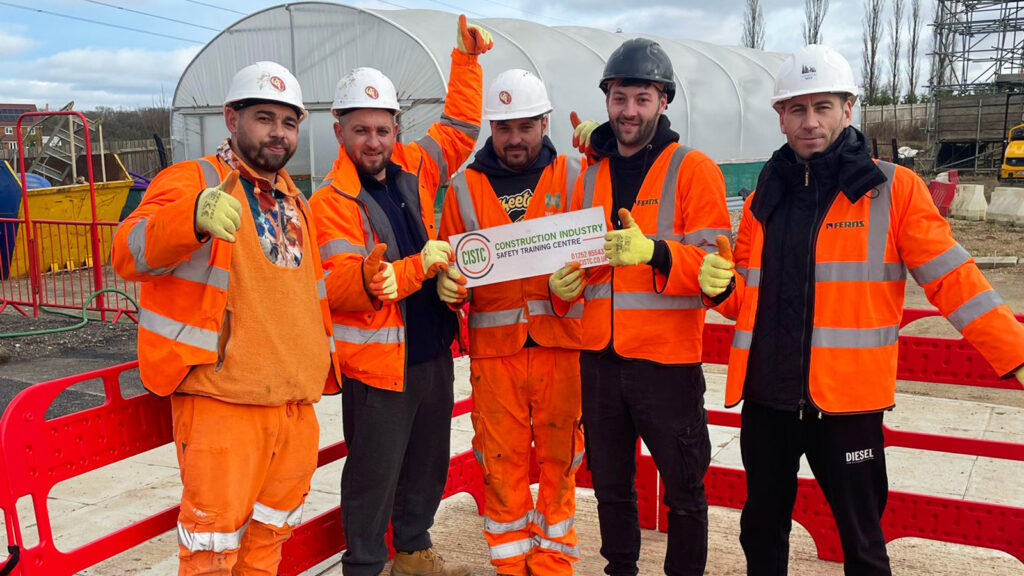 Workers completing a safety training session