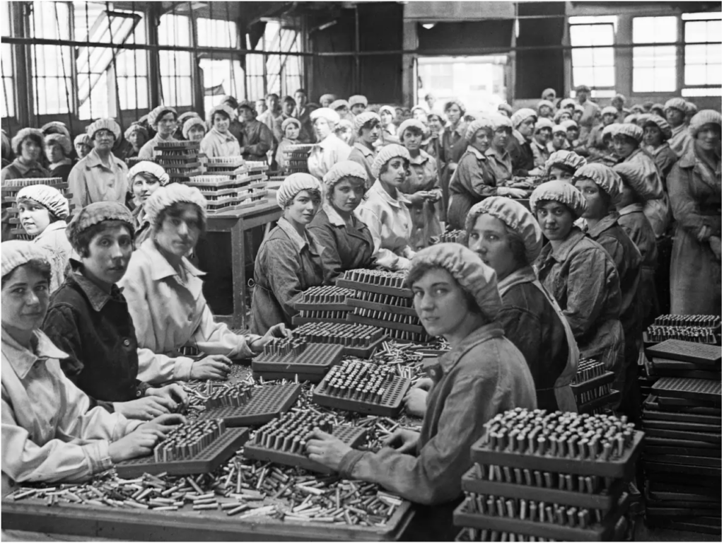 Women at work in an arms factory in London during World War I, 1918