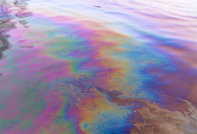 Oil spilled into a water course